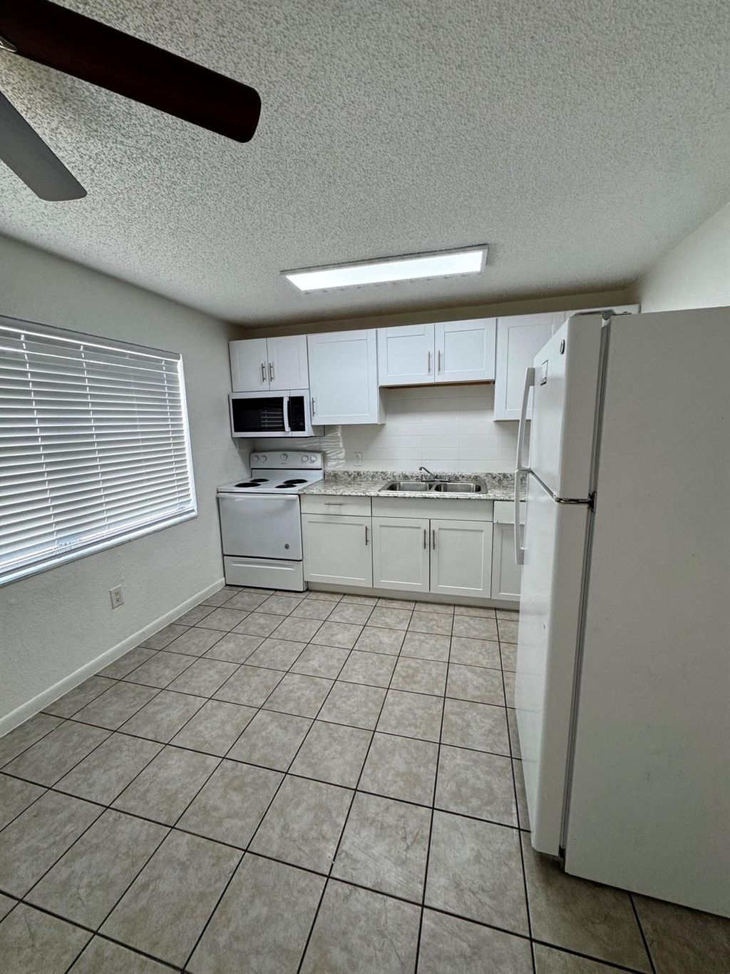 Photo of 3433 Hi Street #3433, Lake Worth, FL 33461 (MLS # F10519810)