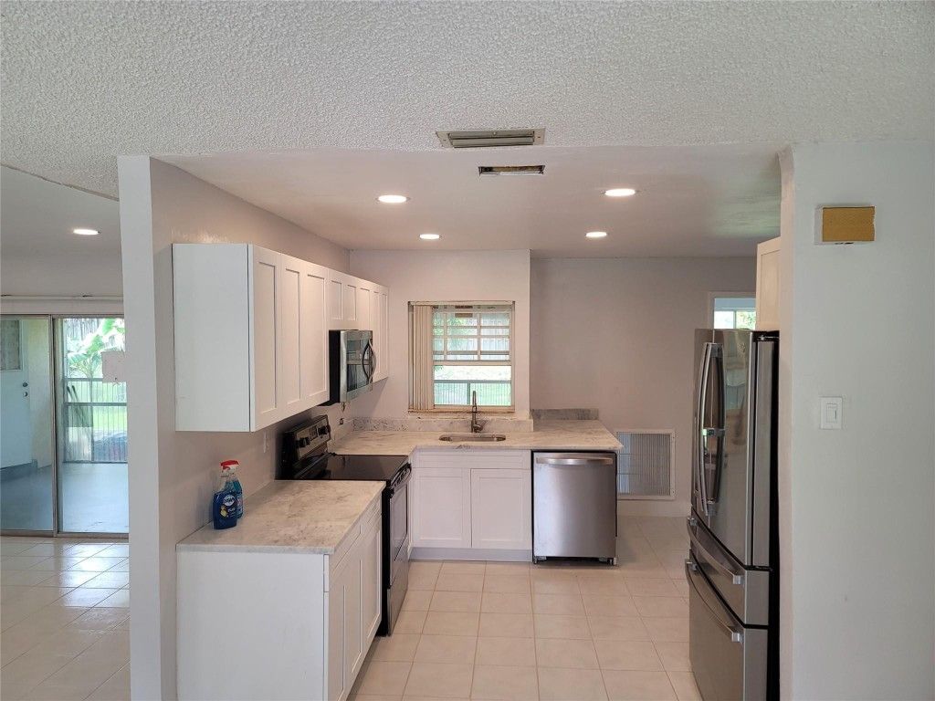 Photo of 775 NW 80th Terrace, Margate, FL 33063 (MLS # F10529615)