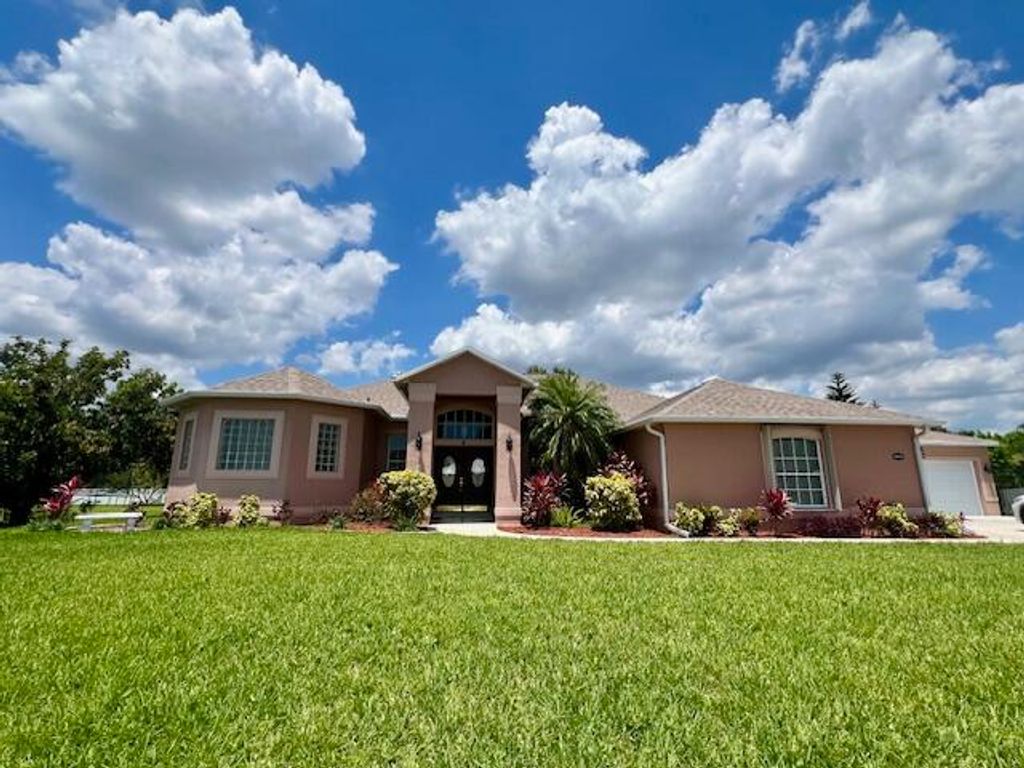 Photo of 2044 SE Morningside Boulevard, Port Saint Lucie, FL 34953 (MLS # R10991796)