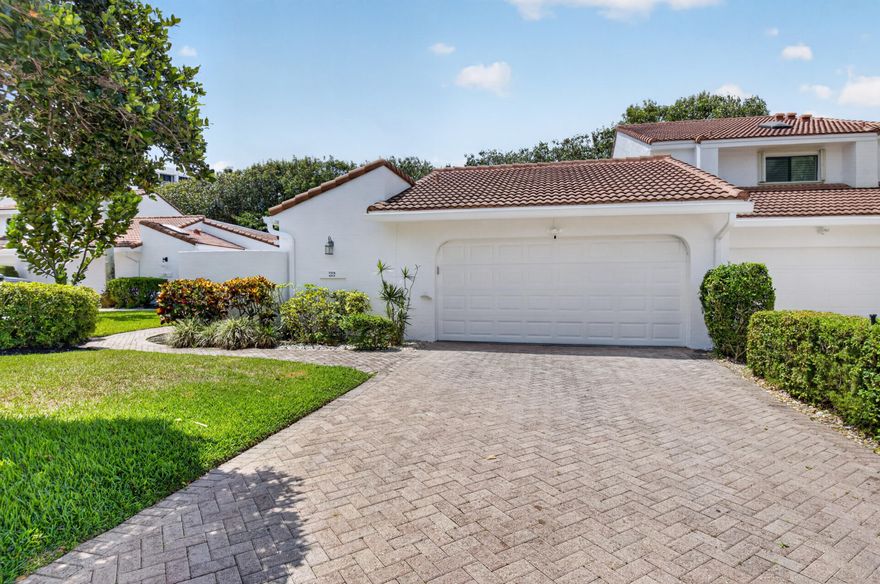 Welcome to 7374 Woodmont Court, a beautifully renovated corner residence in Woodcrest at Boca West Country Club. This 3-bedroom, 2-bath home offers nearly 2,000 square feet of living space with vaulted ceilings, a spacious open layout, new porcelain floors throughout, a stunning new kitchen, and beautifully updated bathrooms. Enjoy indoor-outdoor South Florida living with a new patio, updated pool, and private backyard setting. Additional highlights include a 2-car garage and the privacy of a desirable corner location. Located in one of Boca Raton's premier private country club communities, Boca West offers world-class golf, racquet sports, dining, fitness, social programming, and resort-style amenities. Ideally situated near shopping, dining, beaches, and downtown Boca Raton.