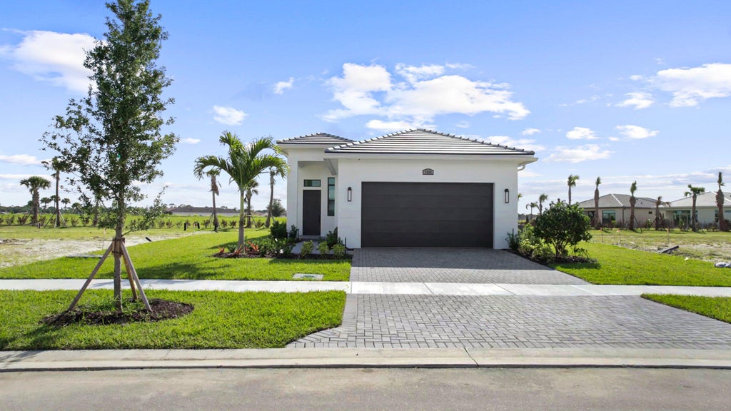 Photo of 7999 SW ANDREA Way, Port Saint Lucie, FL 34987 (MLS # B26072001)