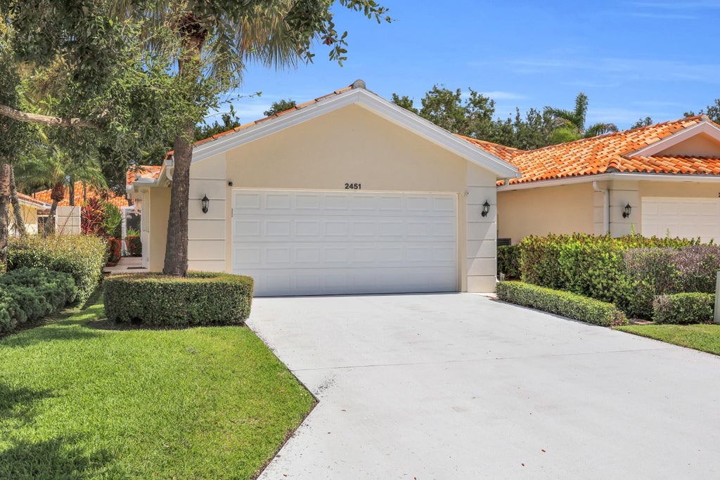 Photo of 2451 SW PARKSIDE Drive, Palm City, FL 34990 (MLS # B26052260)