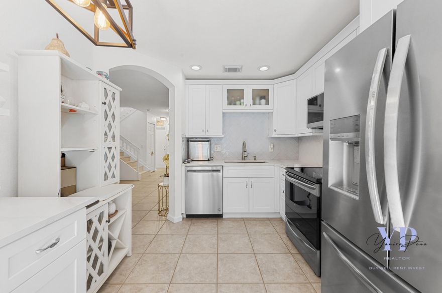 Welcome to this stunning and tastefully remodeled townhome offering comfort, convenience, and style in one of West Palm Beach's most desirable areas. With 2 spacious bedrooms PLUS 1 Guest/Den, 2.5 beautifully updated bathrooms, and new flooring throughout the second level, this home combines modern living with everyday functionality.  Step inside to discover a newly renovated kitchen featuring contemporary finishes, sleek cabinetry, and upgraded appliances—perfect for cooking and entertaining. The open-concept living and dining areas provide a welcoming flow, enhanced by fresh interior paint that brightens every room.  Upstairs, each bedroom offers the privacy of its own en-suite bathroom, creating a perfect setup for families, guests, or shared living. The additional den area can easily serve as a home office, playroom, or guest space.  Located in a well-kept community with a low HOA, residents also enjoy the flexibility of commercial vehicle parking with special permit approval rare benefit in the area.  Property Highlights:  2 Bedrooms + Den | 2.5 Bathrooms Newly Remodeled Kitchen Updated Bathrooms Freshly Painted Interior New Flooring Upstairs Each Bedroom with En-Suite Bathroom Low HOA Fees Commercial Vehicles Allowed (with permit) Convenient Location near Shops, Dining & Major Roads  This home is move-in ready and ideal as a primary residence, seasonal retreat, or investment opportunity. Don't miss your chance to own this gem in the heart of West Palm Beach!