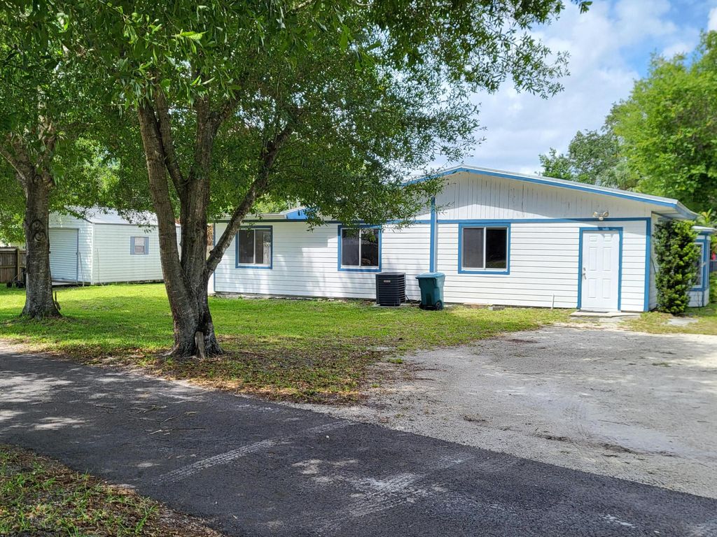 Photo of 203 Melton Drive, Fort Pierce, FL 34982 (MLS # B26001860)