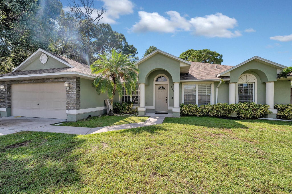 Photo of 2402 SW Massey Street, Port Saint Lucie, FL 34953 (MLS # R11145525)