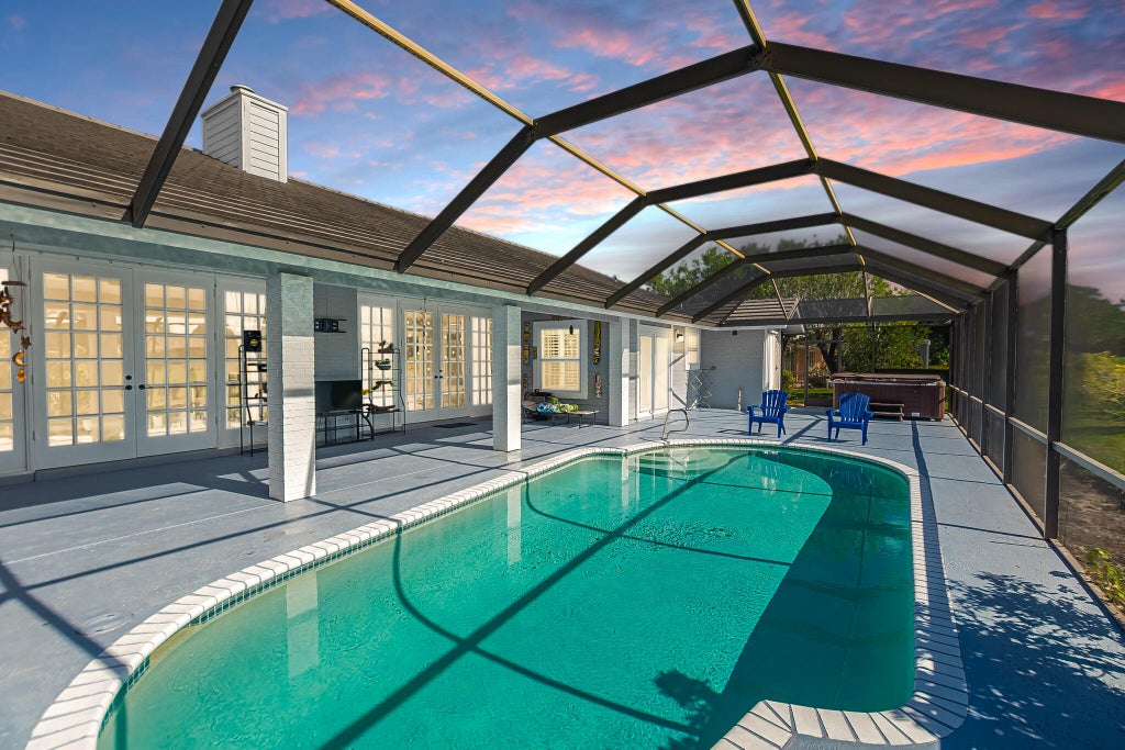 Photo of 1282 SW Bent Pine Cove, Port Saint Lucie, FL 34986 (MLS # B26046961)