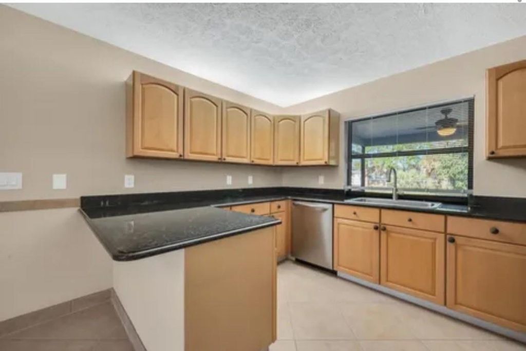 Photo of 3951 SW Cheribon Street, Port Saint Lucie, FL 34953 (MLS # F10506332)