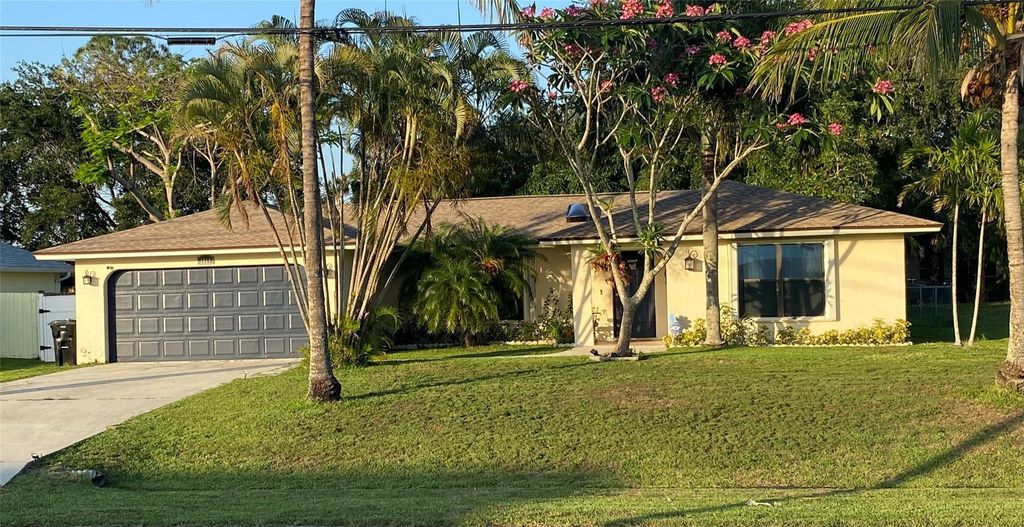 Photo of 3951 SW Cheribon Street, Port Saint Lucie, FL 34953 (MLS # F10506332)