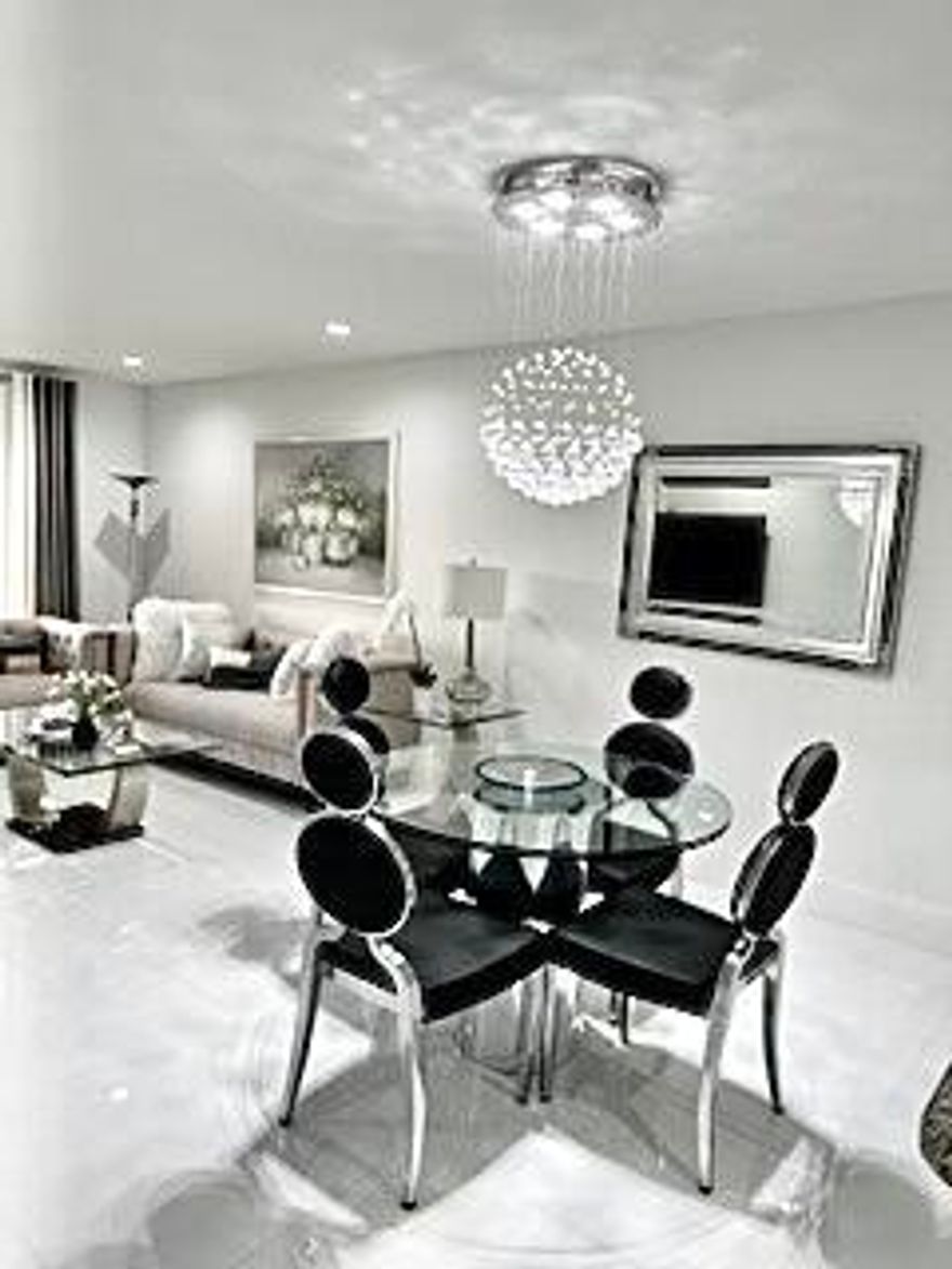 Beautifully updated furnished 1 bedroom 1 bath condo for rent. Cable, internet and water included in rent. Screened in patio over looks the water and golf course. Close to shopping, restaurants and entertainment.