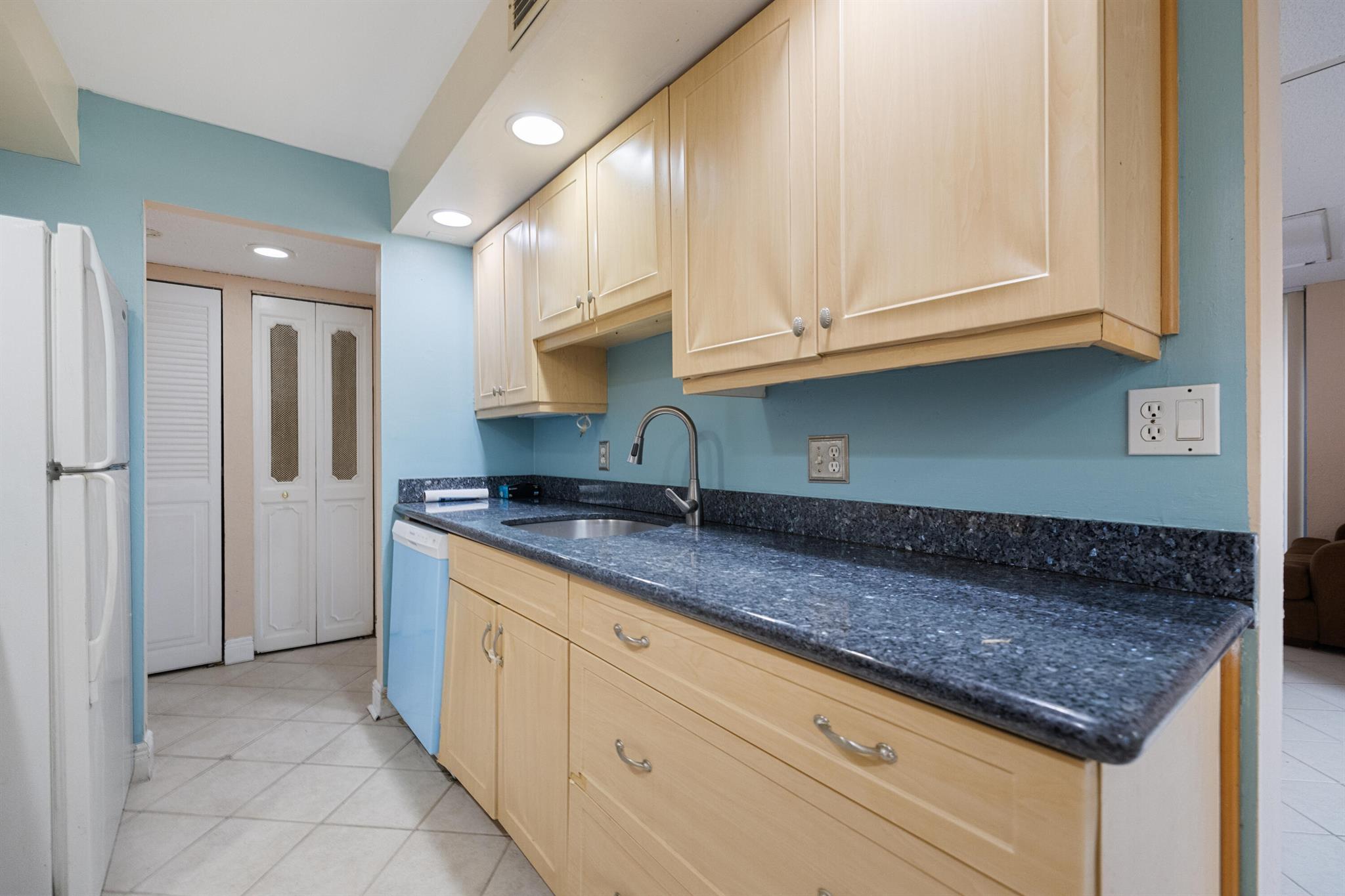 This 2 bedroom, 2 bathroom condo is a fantastic opportunity, offering a spacious ground-floor, corner unit with a large patio--perfect for outdoor relaxation or entertaining. Located in a community that is all ages friendly, this condo is a short walk to the community pool, which is in excellent condition. The property is move-in ready for anyone looking for a comfortable living space.