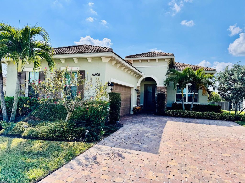 Photo of 11250 SW Lunata Way, Port St Lucie, FL 34987 (MLS # R11065185)