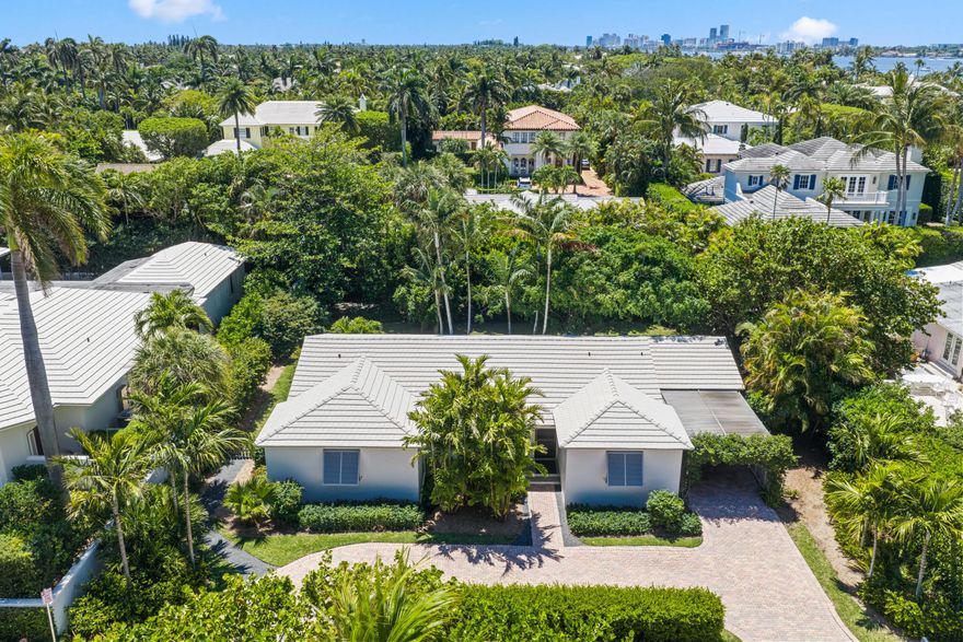 Available now! Rare rental opportunity on a highly desirable North End street, offering access to beautifully maintained beach access and the Lake Trail. This single-story residence features 3 bedrooms and 3 bathrooms, including 2 bedrooms with en suite bathrooms. The home has been thoughtfully updated with a modern kitchen, renovated baths, and lush landscaping. A fully enclosed backyard with patio adds outdoor space. The covered carport includes a generously sized storage room.