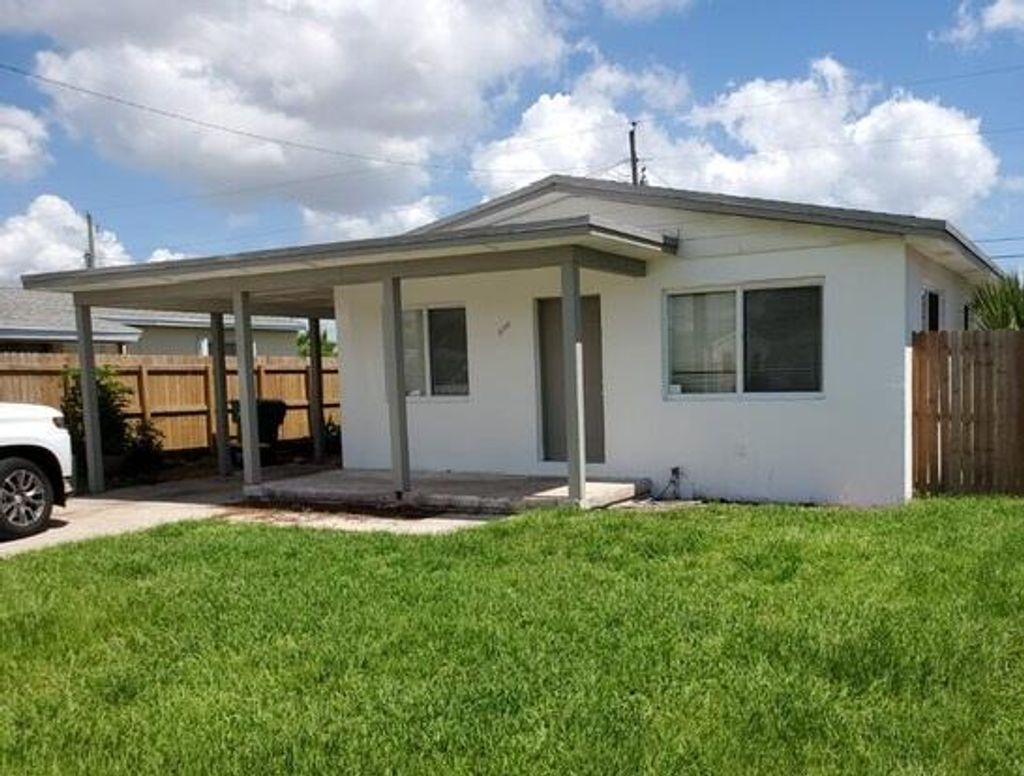 Photo of 958 W 3rd Street, Riviera Beach, FL 33404 (MLS # R11124964)