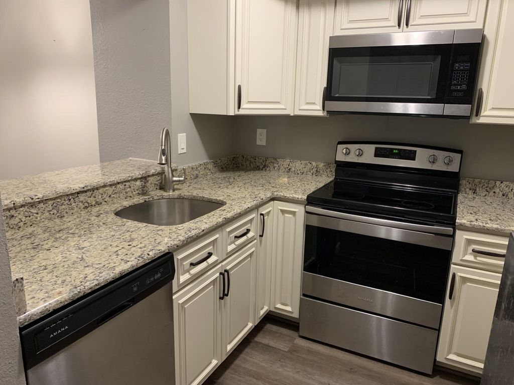 Photo of 1548 SE Royal Green Circle #105, Port Saint Lucie, FL 34952 (MLS # B26021084)