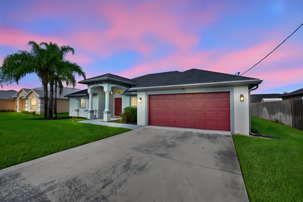 Photo of 5856 NW Mesa Circle, Port Saint Lucie, FL 34986 (MLS # B26091571)