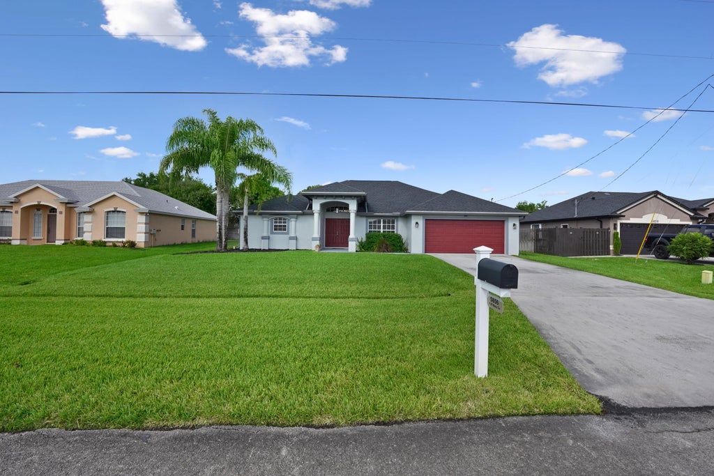 Photo of 5856 NW Mesa Circle, Port Saint Lucie, FL 34986 (MLS # B26091571)