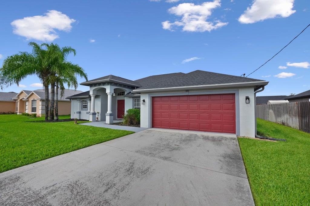 Photo of 5856 NW Mesa Circle, Port Saint Lucie, FL 34986 (MLS # B26091571)