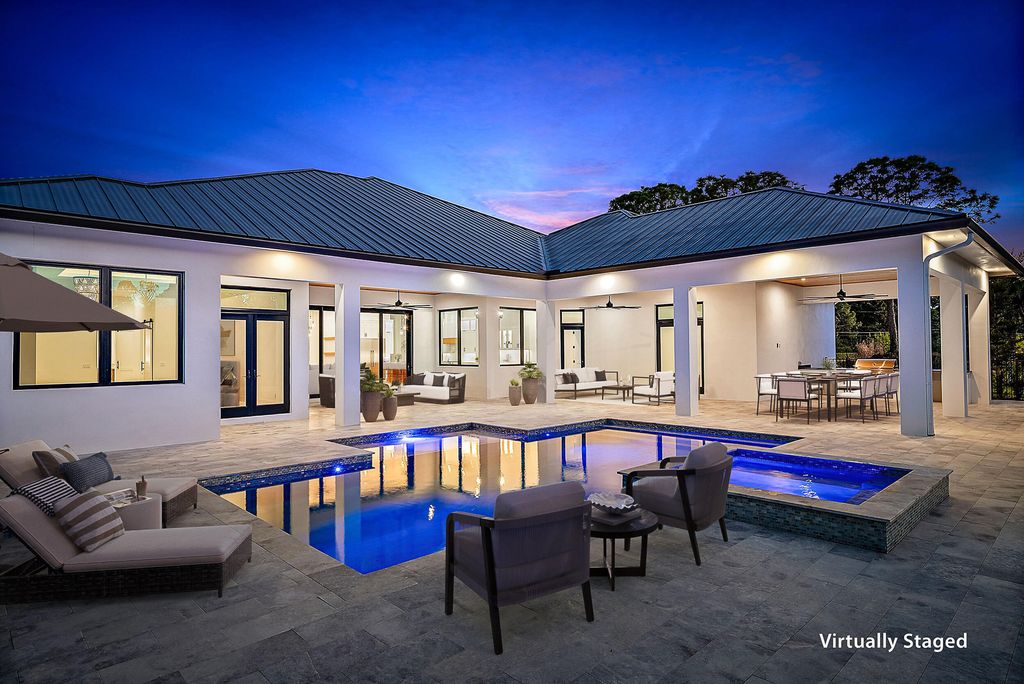 Photo of 14527 Pepper Bush Drive, Palm Beach Gardens, FL 33418 (MLS # R11150568)