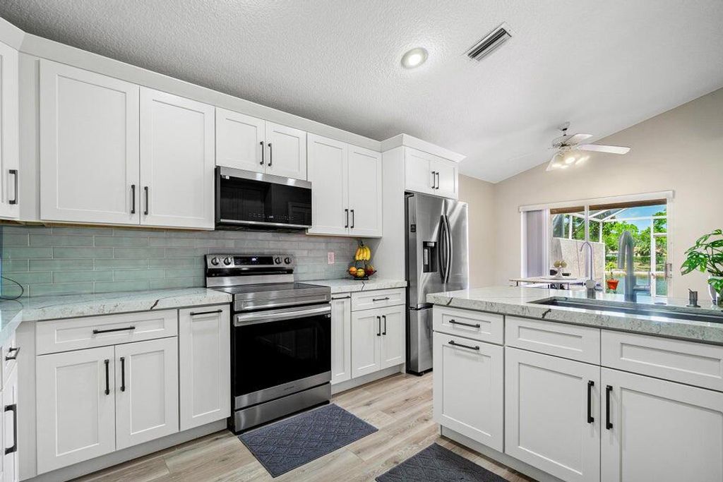 Photo of 10560 Plainview Circle, Boca Raton, FL 33498 (MLS # R11094695)