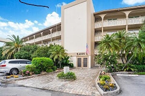 Photo of 2305 Lucaya Lane #G1, Coconut Creek, FL 33066 (MLS # B26011462)