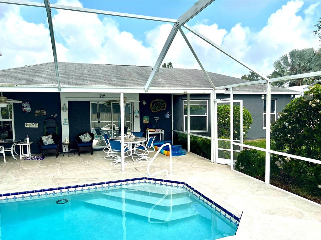 Photo of 131 NW Friar St, Port Saint Lucie, FL 34983 (MLS # F10444993)