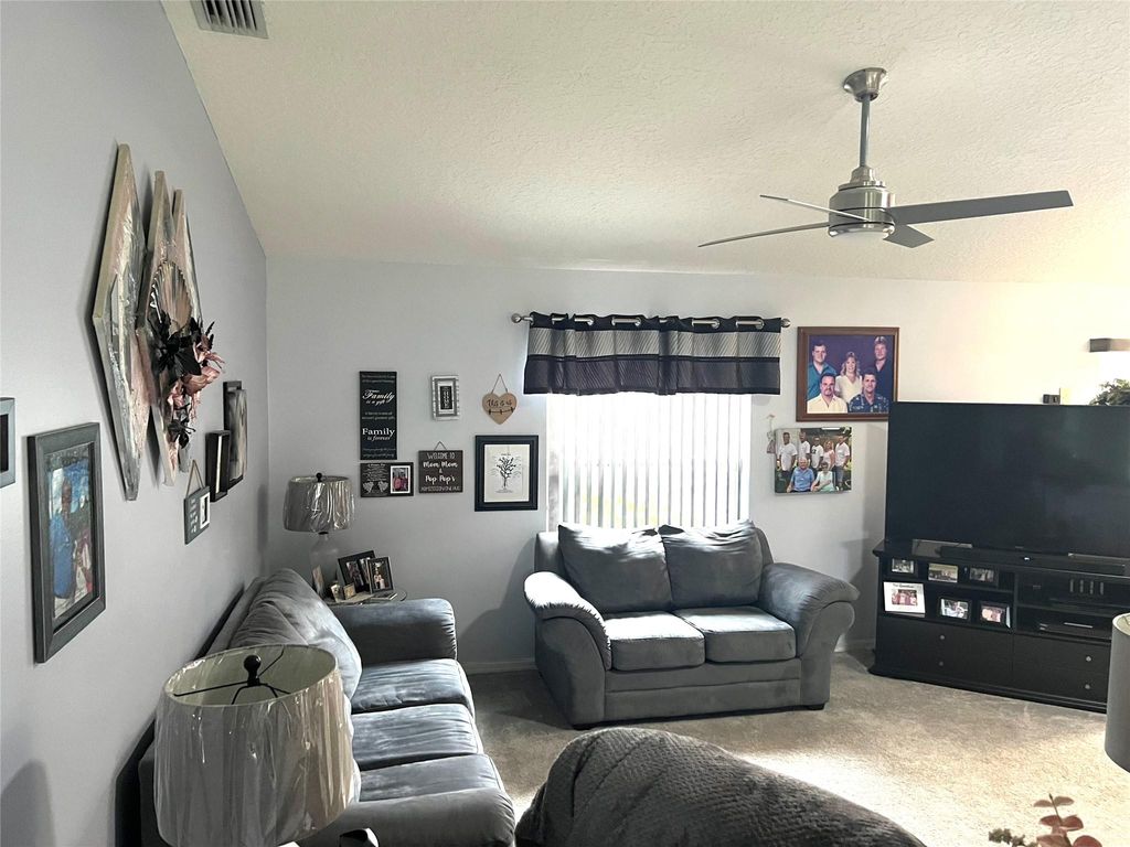 Photo of 131 NW Friar St, Port Saint Lucie, FL 34983 (MLS # F10444993)