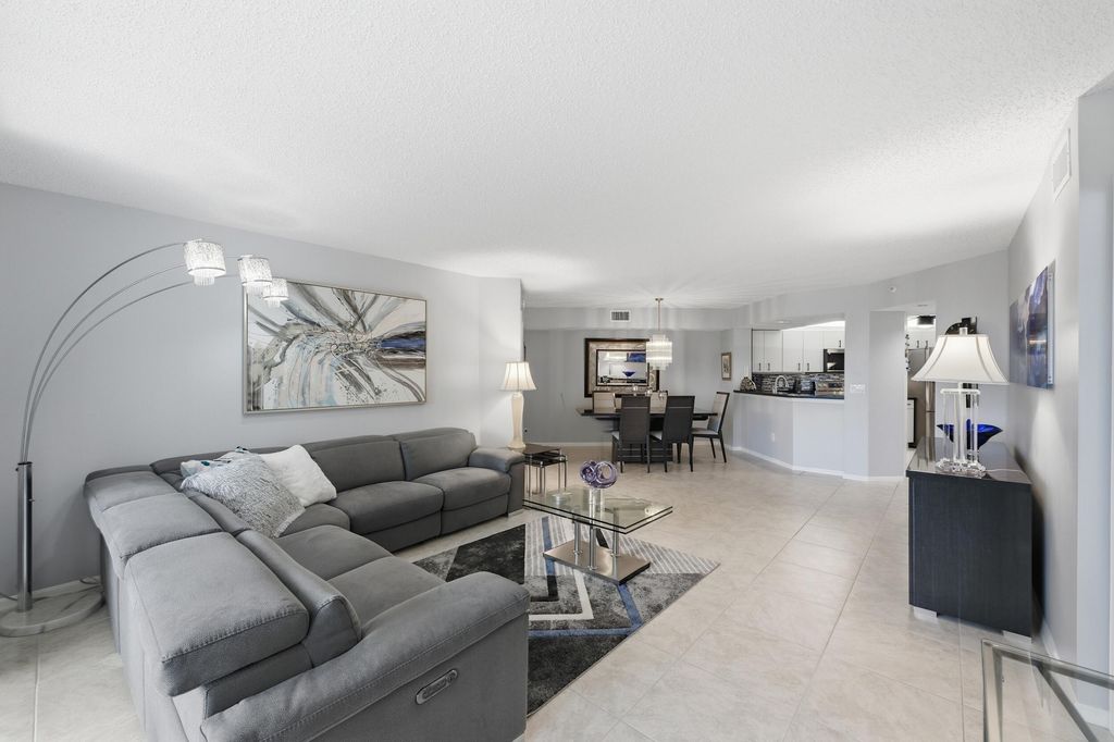 Photo of 9587 Weldon Circle #B308, Tamarac, FL 33321 (MLS # B26033969)