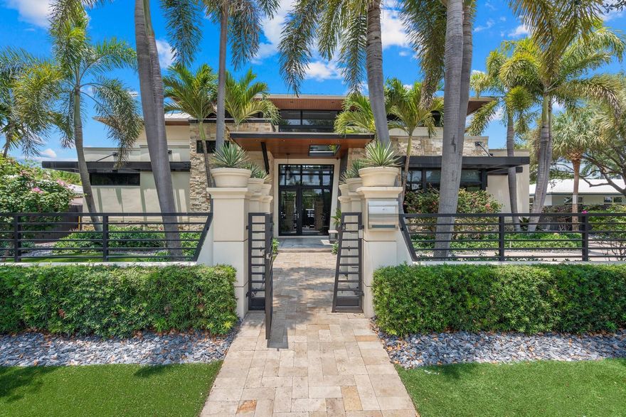 A Blend Of Art & Modern Architecture Define this Newer Construction Home In Coral Ridge Beautifully Crafted w/ The Finest Materials & Finishes. 2-Story 5 Br 5.5 Ba & Office w/ Separate Full-Living Guest Quarters On Spectacular Oversized Gated Lot. As You Enter, You're Captivated By The 2-Story GR Rm w/ Wall Of Glass, Seamlessly Connecting The LR, DR, Bar & Kitchen Areas. Kitchen Features High-End Appliances, Granite Countertops & Custom Cabinetry. High Ceilings & Large Windows Allow For Great Natural Lighting. Step Outside To Your Private Oasis w/ Tropical Landscaping , Pool, Spa & Covered Outdoor Kitchen, Wet Bar, Dining & Lounging Areas. New Whole House Generator, New Landscaping Turf, New Pool Heater/Chiller, Smart Home, Whole House Sound, Electric Blinds, Central Vac, Oversized Garage.