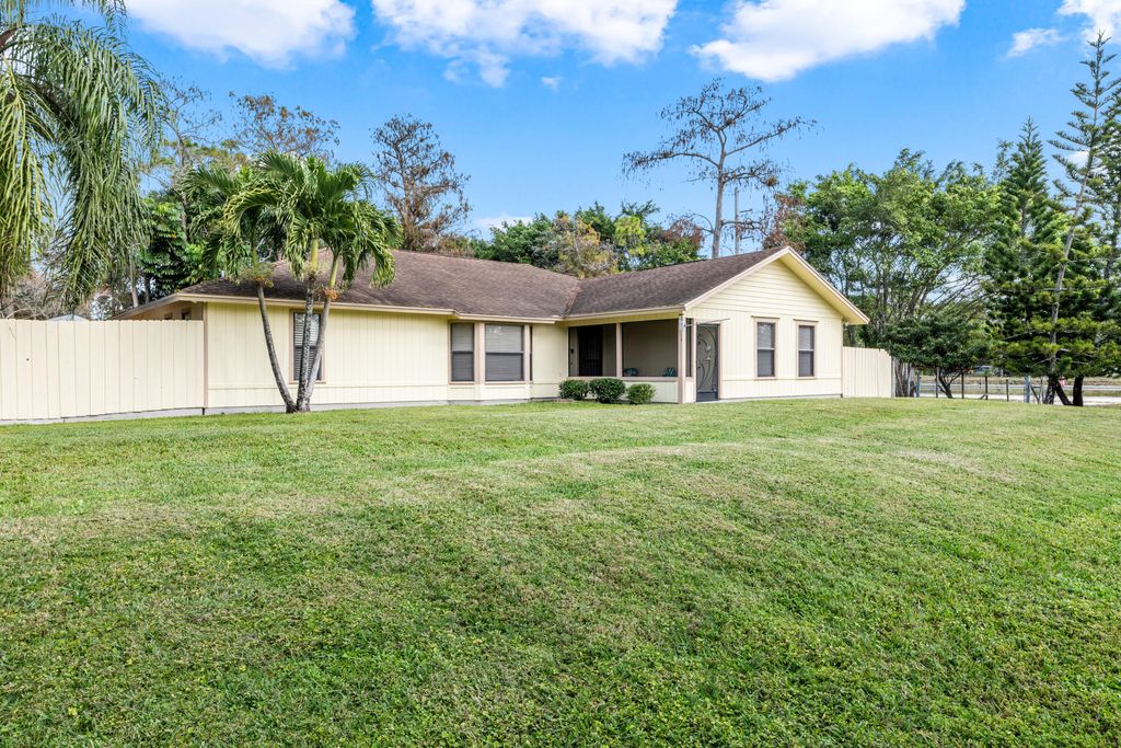 Photo of 16887 W Cornwall Drive, The Acreage, FL 33470 (MLS # R10949505)