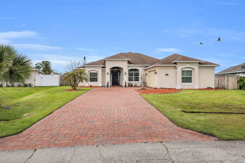 Photo of 5816 NW Whitecap Road, Port Saint Lucie, FL 34986 (MLS # B26016378)