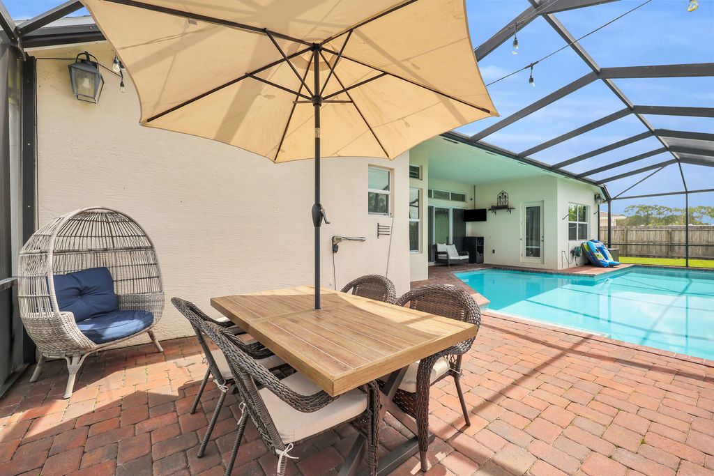Photo of 5816 NW Whitecap Road, Port Saint Lucie, FL 34986 (MLS # B26016378)