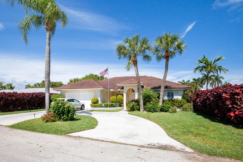 Photo of 119 Cascade Lane, Palm Beach Shores, FL 33404 (MLS # R10781178)