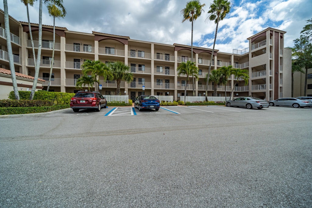 Photo of 6241 Pointe Regal Circle #409, Delray Beach, FL 33484 (MLS # R10794478)
