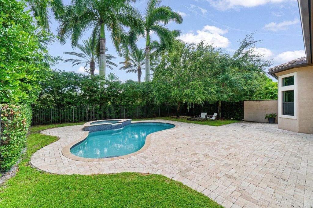Photo of 8574 Lewis River Road, Delray Beach, FL 33446 (MLS # R11102618)