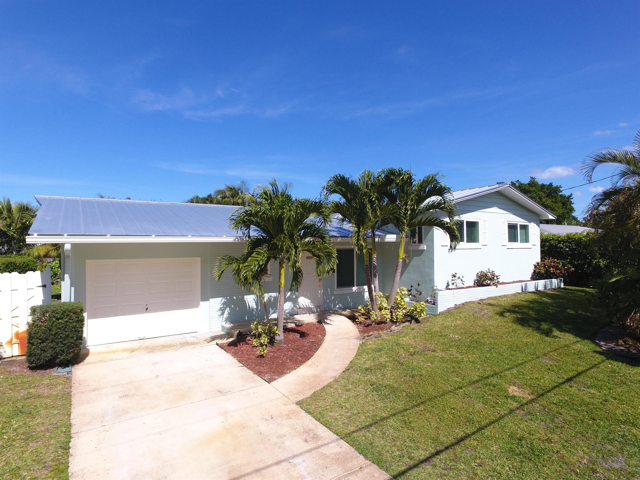 3 bedroom home located in the Village of North Palm Beach! Features include a brand new roof, new AC, fresh paint, hurricane impact windows, renovated bathrooms, granite countertops, large backyard, washer & dryer, 1 car garage & more. Professional landscaping is included in rent. Above average credit and consistent income of approx 3x the rent required. Up to 2 pets considered on a case by case basis with pet fees paid. 2 vehicle maximum.