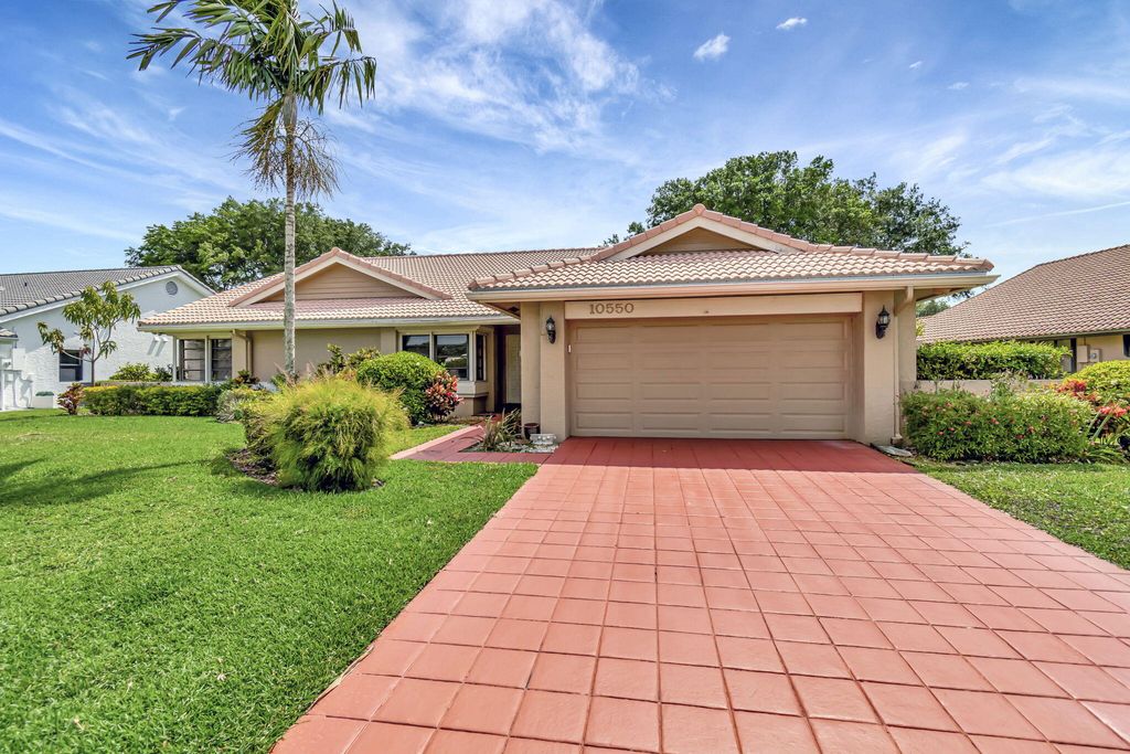 Photo of 10550 Boca Woods Lane, Boca Raton, FL 33428 (MLS # R10975360)