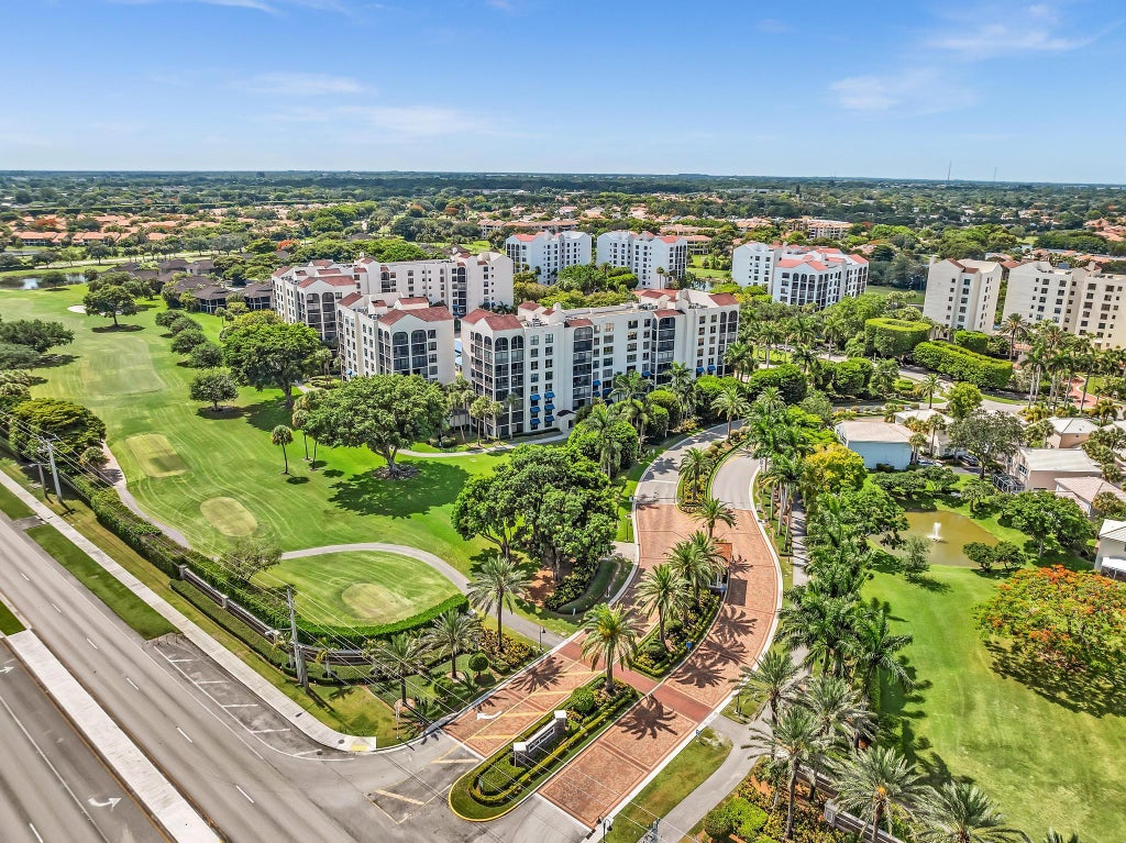 Photo of 7564 REGENCY LAKE Drive #202, Boca Raton, FL 33433 (MLS # B26073036)