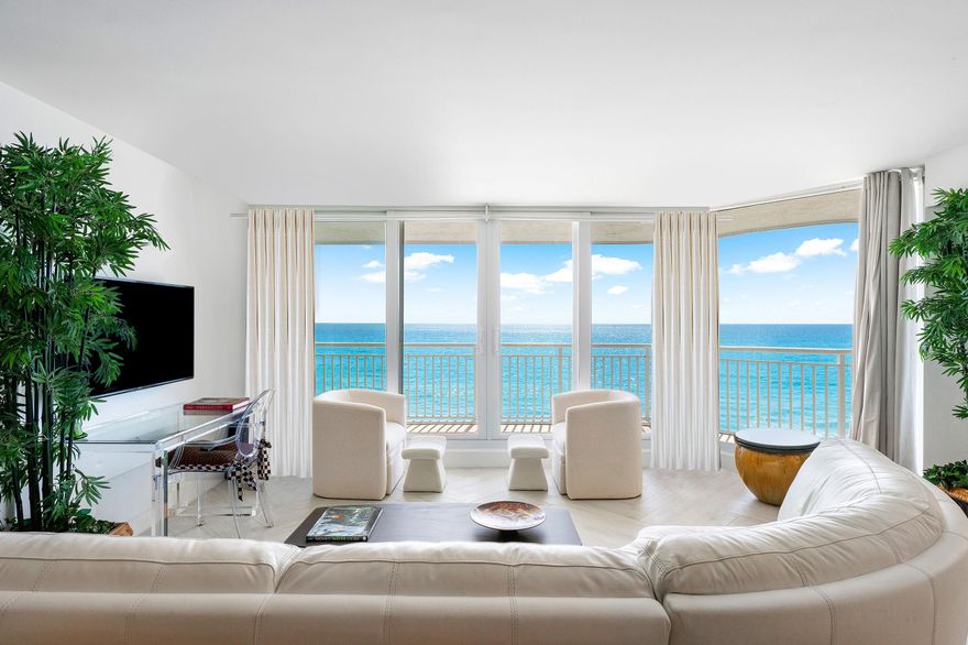 Enter into coastal modern luxury with this fully renovated 2,400sqft, 2-bedroom, 2.5-bathroom oceanfront residence at the exclusive 3600 S Ocean. Accessible via a private elevator entrance, this elegantly designed condo boasts breathtaking direct ocean views to the east and serene sunset vistas to the west from its ultra-large private balconies. The open-concept kitchen w/ ultra-long island and great room are an entertainer's dream, featuring detailed quartz countertops, high-end appliances, a wet bar, and a wine fridge. The residence showcases chevron wood tile flooring throughout, impact glass windows, fitted walk-in closets, and spa-inspired bathrooms. Additional conveniences include an in-unit washer/dryer and two covered parking spaces. Enjoy resort-style living with an oceanfront... pool, fitness center, and private beach access in this boutique building. Located moments from Eau Palm Beach, the Four Seasons, premier shopping, and dining, with easy access to PBI Airport and Downtown West Palm Beach. Luxury coastal living at its finest.