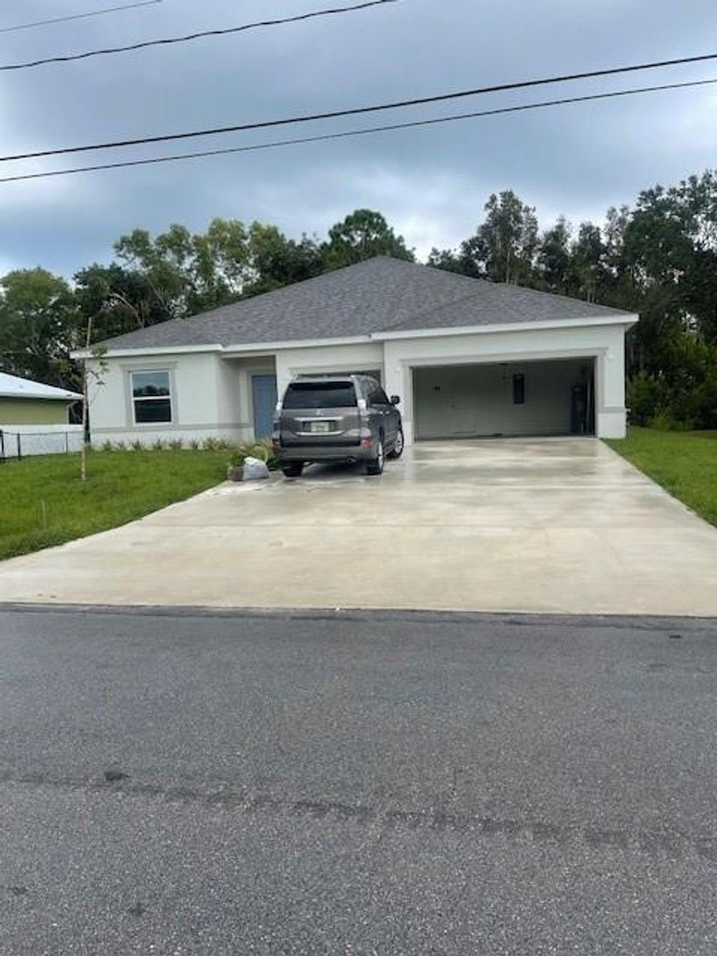 Photo of 4958 Flintstone Ave, Port Saint Lucie, FL 34983 (MLS # F10468306)