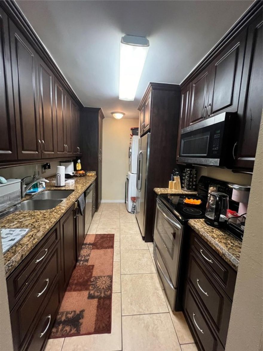 Beautifully updated 2-bedroom, 2-bathroom condo featuring upgraded bathrooms and a stylish kitchen with wood cabinets, granite countertops, and stainless steel appliances. The unit boasts 18x18 tile floors, a full-size upgraded washer and dryer, and a screened-in porch with serene lake views. The complex offers an array of amenities, including a clubhouse, business center, fitness center with a jacuzzi, volleyball court, running trail, pet-friendly areas, and barbecue grills with picnic tables overlooking the lake and lush landscaping. Ideally located near shopping, dining, Sawgrass Mall, and major roads.