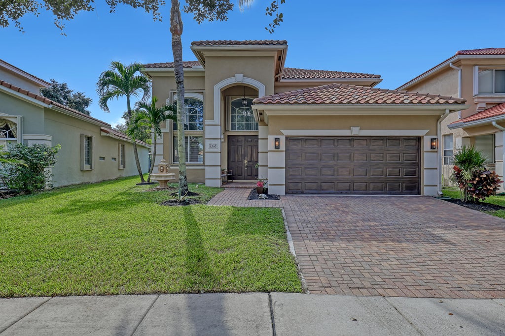 Photo of 762 GAZETTA Way, West Palm Beach, FL 33413 (MLS # B26092634)
