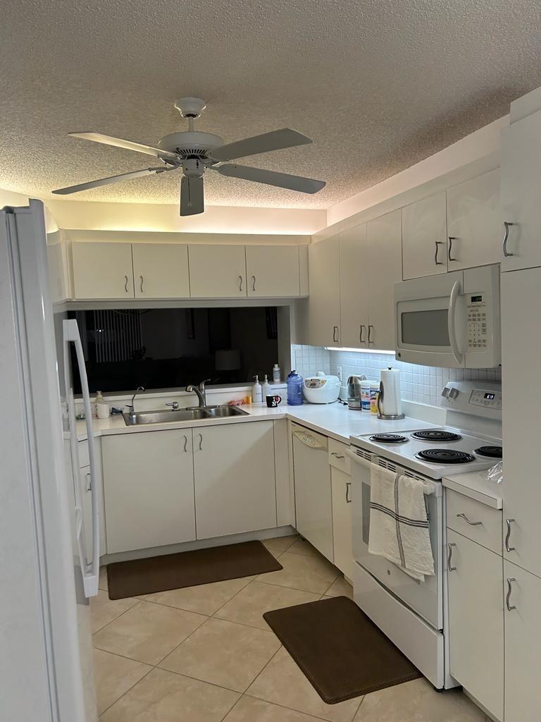 55+ COMMUNITY, THIS HARD TO FIND PORTOFINO MODEL, INSIDE CORNER UNIT IS ON THE 2nd FLOOR, WELL KEPT BUILDING #196. BEAUTIFUL VIEWS FROM THE FLORIDA ROOM WINDOWS. TILE THROUGHOUT, WITH THE EXCEPTION OF THE BEDROOMS WHICH BOTH HAVE LAMINATE, REMODELED BATHROOMS MAKE THIS UNIT STAND OUT! FURNITURE OFFERED FOR SALE SEPERATELY. THIS IS A RARE FIND, & WILL NOT LAST LONG.
IT IS LOCATED RIGHT NEXT TO A SATELLITE YEAR-ROUND HEATED POOL, SAUNA, BILLARD, TENNIS AND PICKLEBALL COURT. PICTURESQUE WATER AND GOLF VIEWS FROM WINDOWS. GOLF COMMUNITY, WITH A GREAT CLUBHOUSE THAT OFFERS MOVIES, CONCERTS, LIVE SHOWS & THEATER. BRING YOUR FUSSIEST BUYERS. COURTESY CALL CALL FOR SHOWING ONLY. NO SHOWINGS AFTER 6:00 P.M. OWNER OCCUPIED. ASSOCIATION REQUIRES $3,125 A MONTH NET INCOME AND 700 CREDIT SCORE.