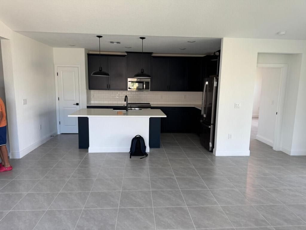 Photo of 1073 SW Benchor Avenue, Port Saint Lucie, FL 34953 (MLS # R11139705)