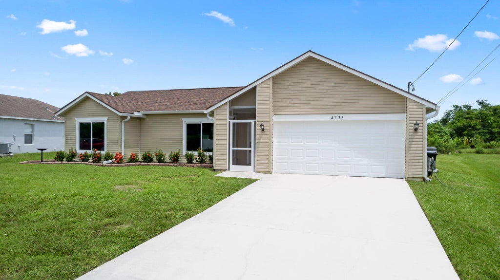 Photo of 4225 SW Dido Drive, Port Saint Lucie, FL 34953 (MLS # R11014849)