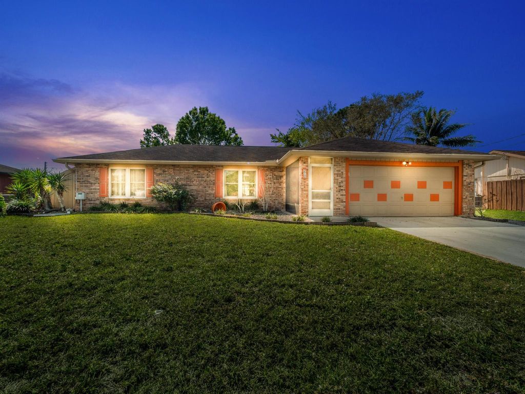 Photo of 210 SW Amesbury Avenue, Port Saint Lucie, FL 34953 (MLS # R10963239)