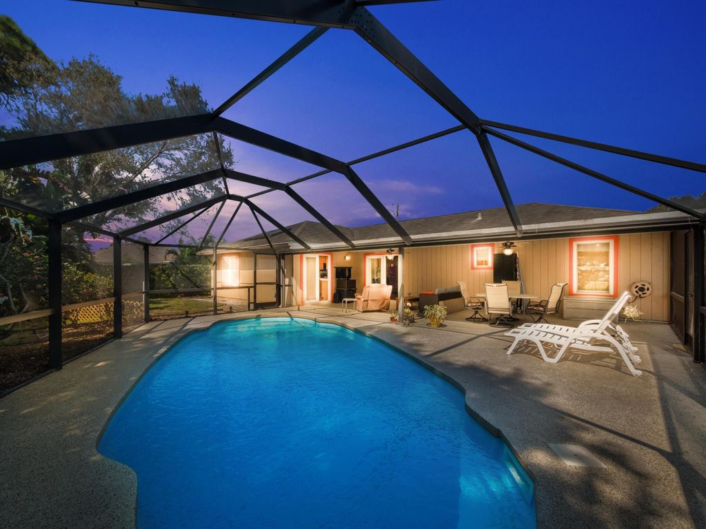 Photo of 210 SW Amesbury Avenue, Port Saint Lucie, FL 34953 (MLS # R10963239)