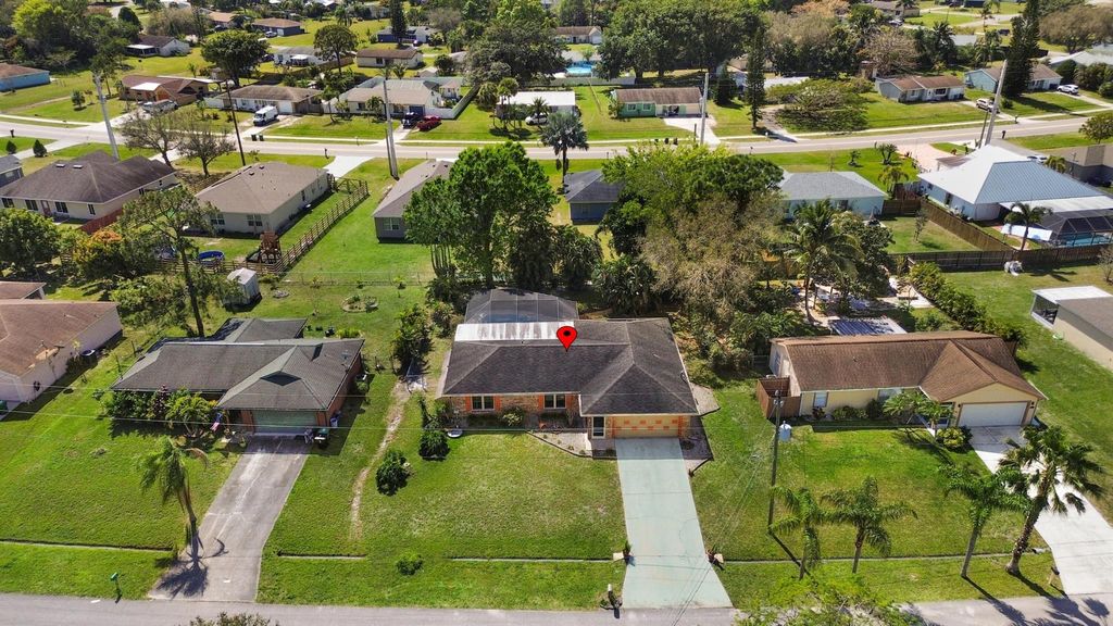 Photo of 210 SW Amesbury Avenue, Port Saint Lucie, FL 34953 (MLS # R10963239)
