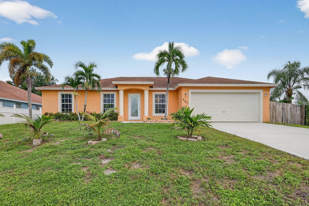 Photo of 497 SW Lacroix Avenue, Port Saint Lucie, FL 34953 (MLS # F10532025)
