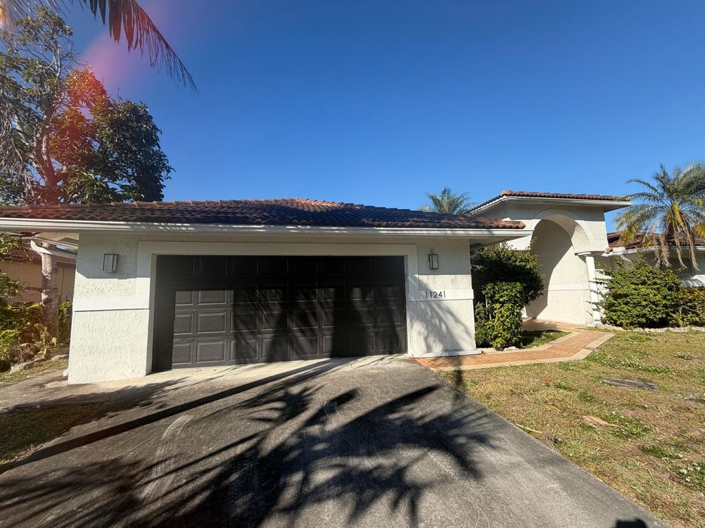 Photo of 11241 NW 22nd Street, Plantation, FL 33323 (MLS # B26017379)