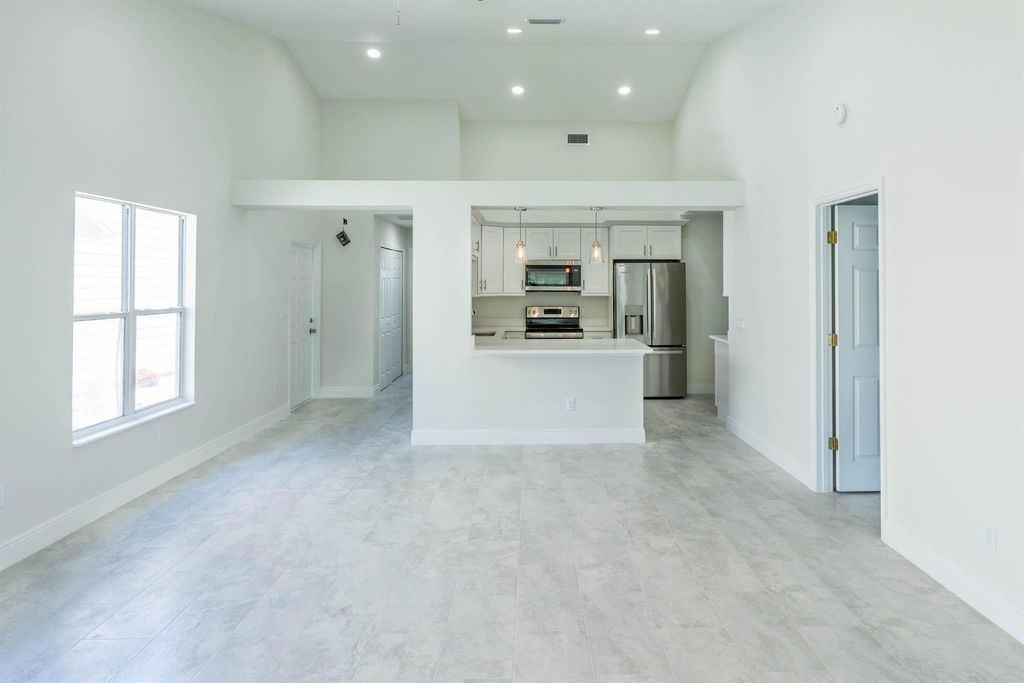 Photo of 2533 SE Tropical East Circle, Port Saint Lucie, FL 34952 (MLS # R10990603)